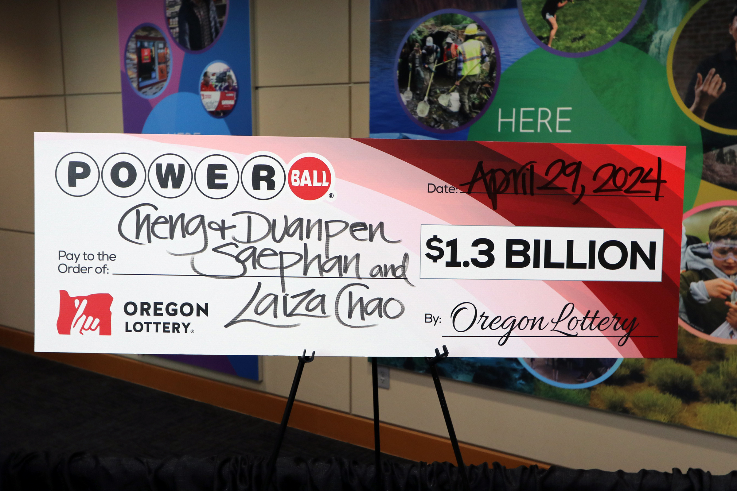 Powerball 1.3 Billion Dollar Winner Cheng Saephan Recieves Check For